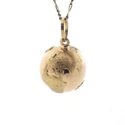 Image 1 of 18 carat gold globe pendant