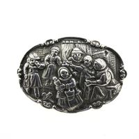 Vintage silver brooch with scene