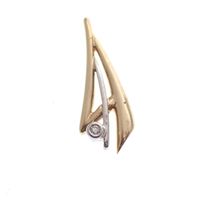 Two-tone gold fantasy pendant with diamond; 0.02 ct.