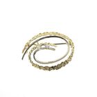 Image 1 of Two-tone gold brooch with diamond; 0.08 ct.