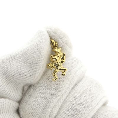 Image 2 of Gold pendant of a frog with an umbrella