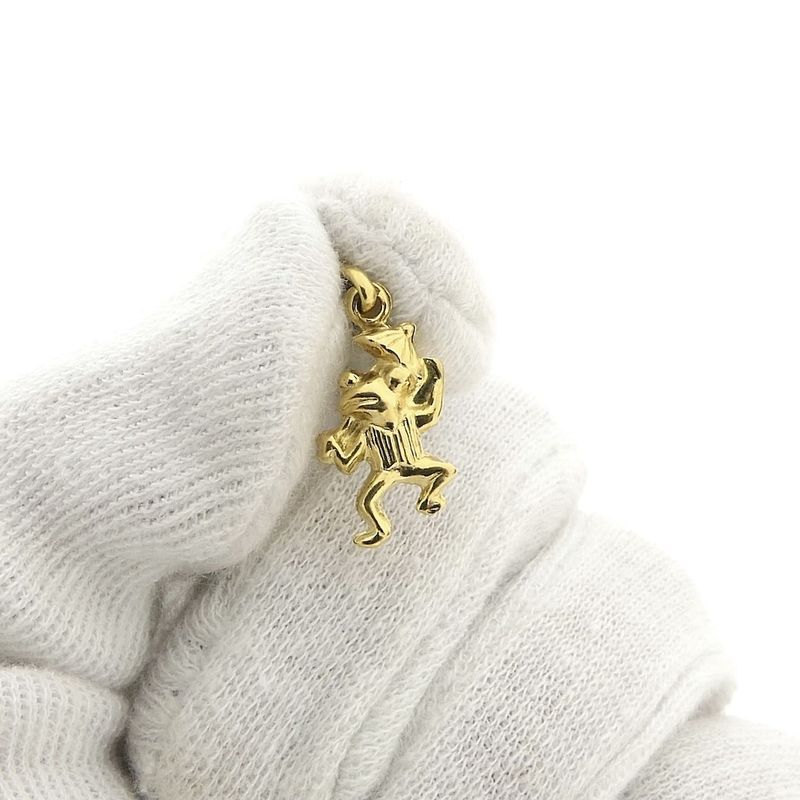 Image 2 of Gold pendant of a frog with an umbrella