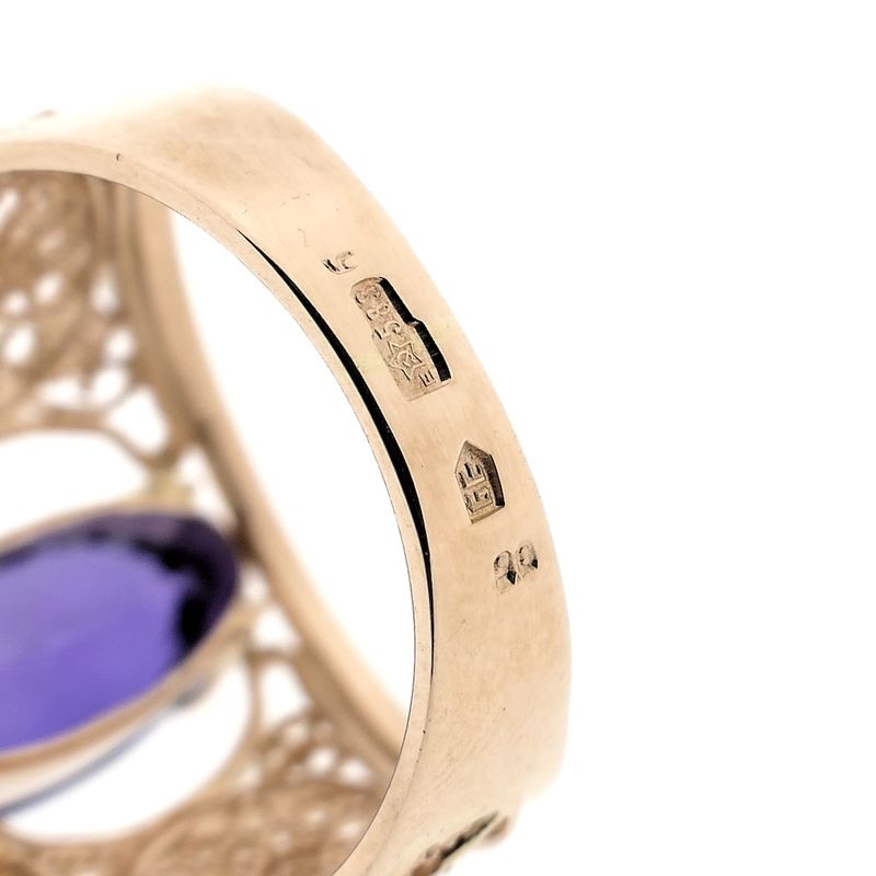 Image 8 of Vintage rose gold ring set with a synthetic purple gemstone.