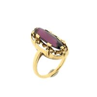 Gold ring with garnet