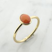 Gold ring with blood coral