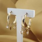 Image 2 of Two-tone gold earrings with charms and zirconia | Ø 23.0 mm