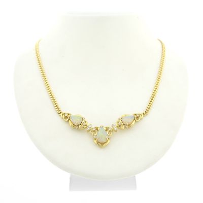 Image 1 of 18-karat gold necklace with a fixed pendant; Opal and diamond 0.46 ct. | 43 cm