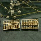 Image 2 of Gold cufflinks as an abacus.