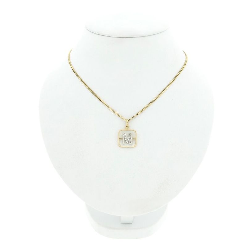 Image 3 of Two-tone gold pendant of the letter M with diamonds; 0.03 ct.