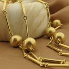 Image 2 of Gold long chain/saucer with beads