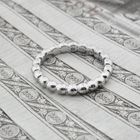 Image 2 of White gold sliding ring with balls