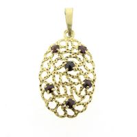 Vintage gold pendant with garnet