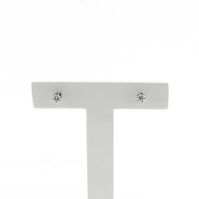 Image 1 of White gold solitaire stud earrings with 0.12 ct diamond.