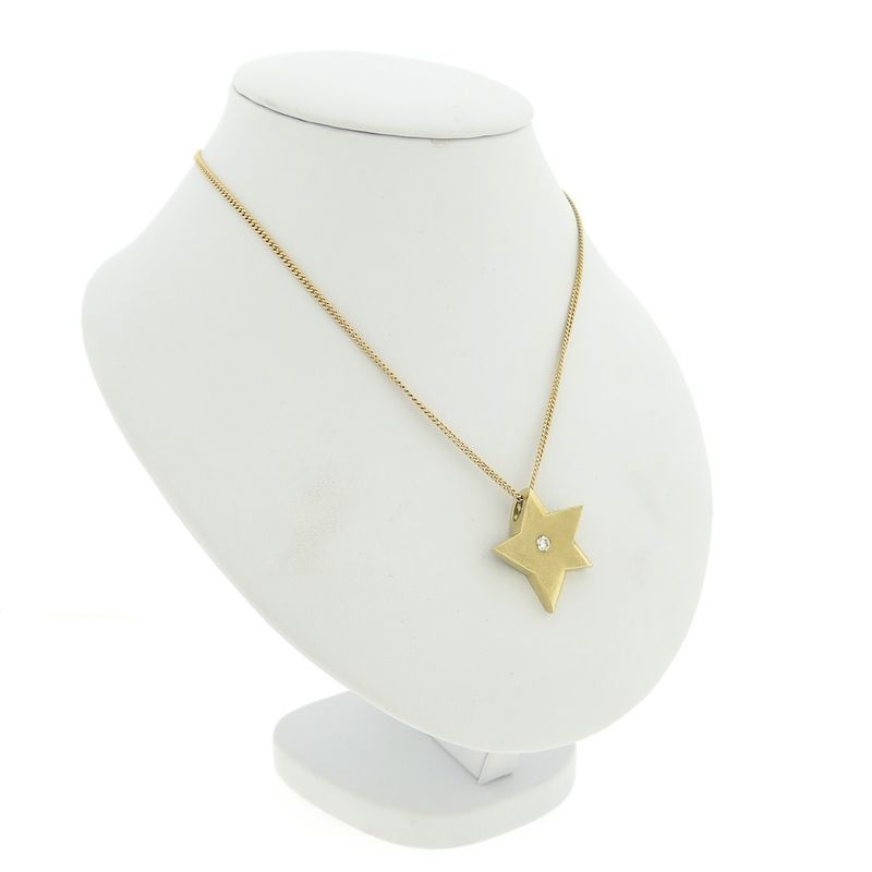 Image 11 of Gold star pendant with diamond; 0.14 ct.