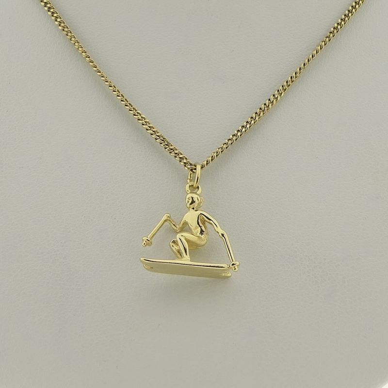 Image 10 of Gold pendant of a skier