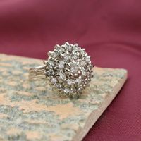Antique white gold entourage ring with diamonds; 1.29 ct.