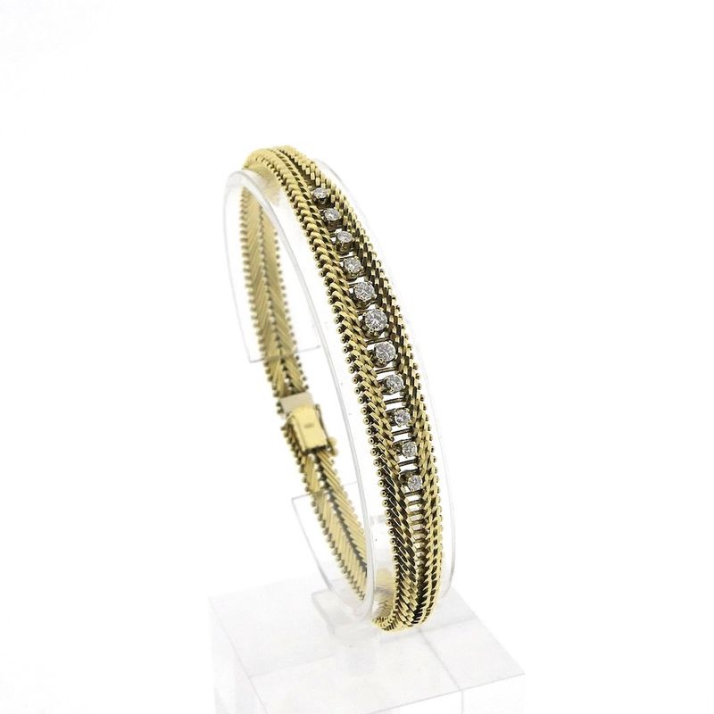 Image 1 of Gold herringbone link bracelet with diamond; 0.62 ct.