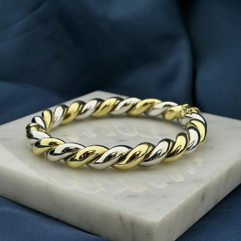 Image 2 of Two-tone gold twisted slave bracelet.