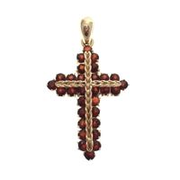 Gold pendant of the cross with garnet stones