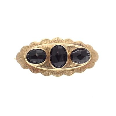 Image 1 of Vintage gold brooch with garnet