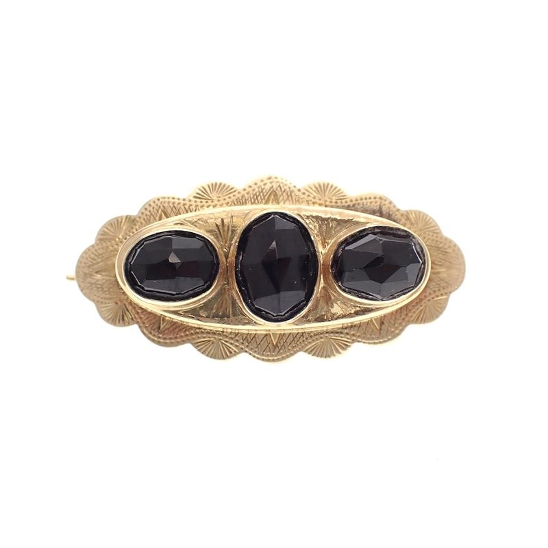 Image 1 of Vintage gold brooch with garnet