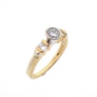 Two-tone gold ring with diamonds; 0.54