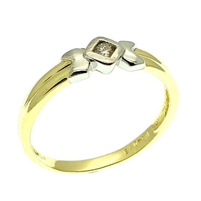 Image 1 of Two-tone gold solitaire ring with 0.04 ct diamond.