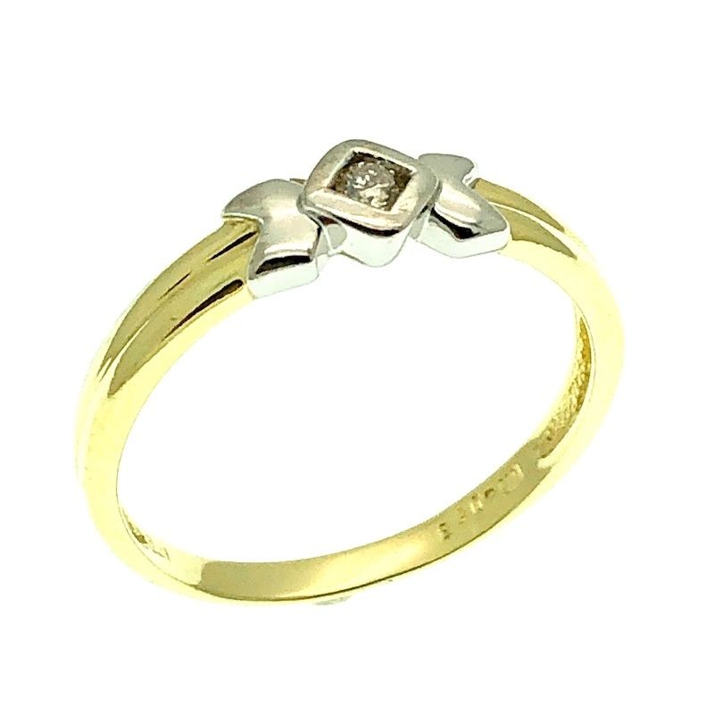 Image 1 of Two-tone gold solitaire ring with 0.04 ct diamond.