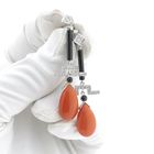 Image 2 of White gold stud earrings with onyx, blood coral and diamond 0.17 ct.