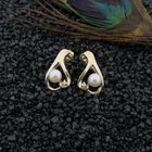 Image 2 of Gold stud earrings with pearl and diamond; 0.02 ct.