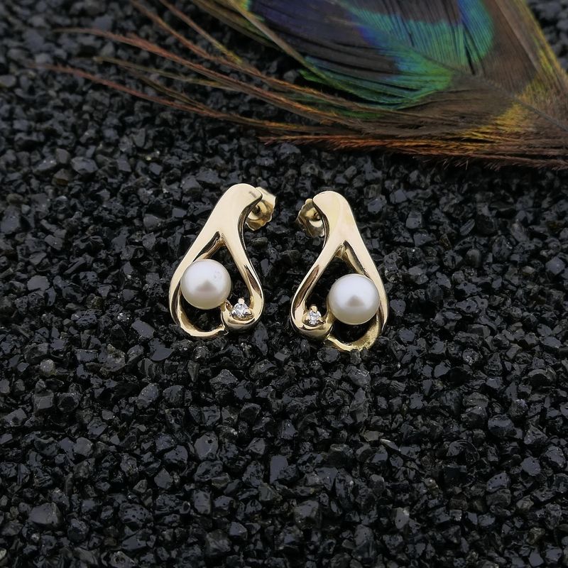 Image 2 of Gold stud earrings with pearl and diamond; 0.02 ct.