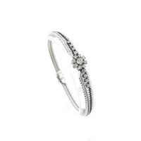 White gold herringbone link bracelet with 1.00 ct. diamonds.