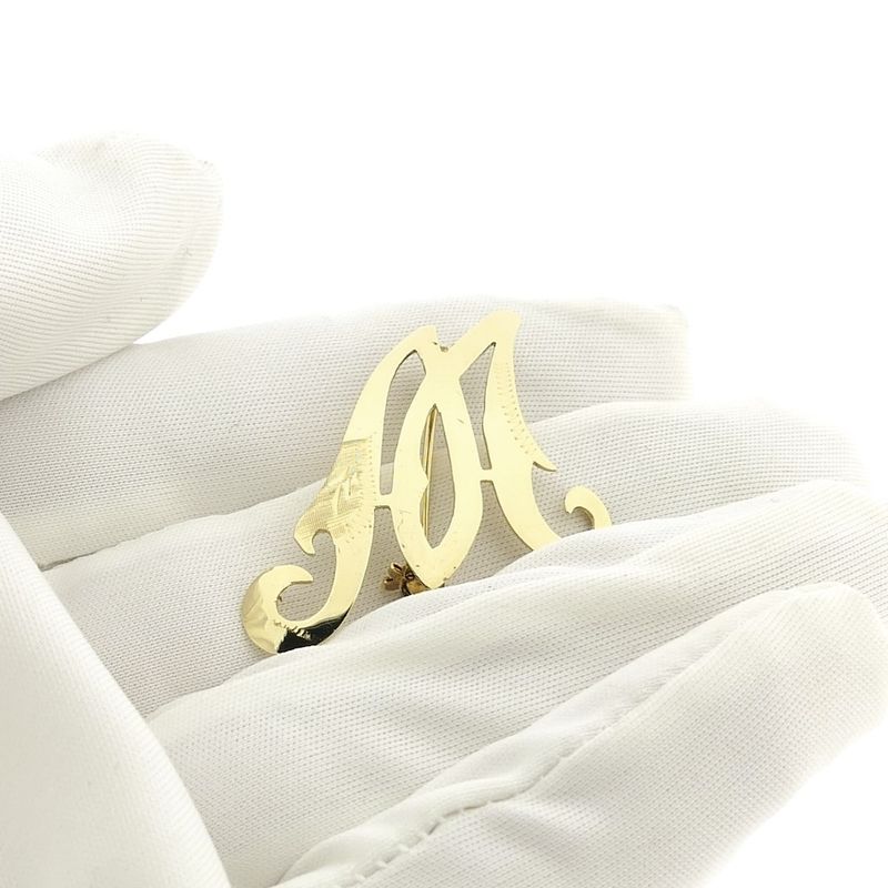Image 7 of Gold letter brooch; letter M