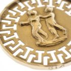 Image 3 of 18 kt gold pendant of the Gemini zodiac sign