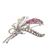 White gold floral brooch set with spinel, pearl and diamond 0.57 ct.
