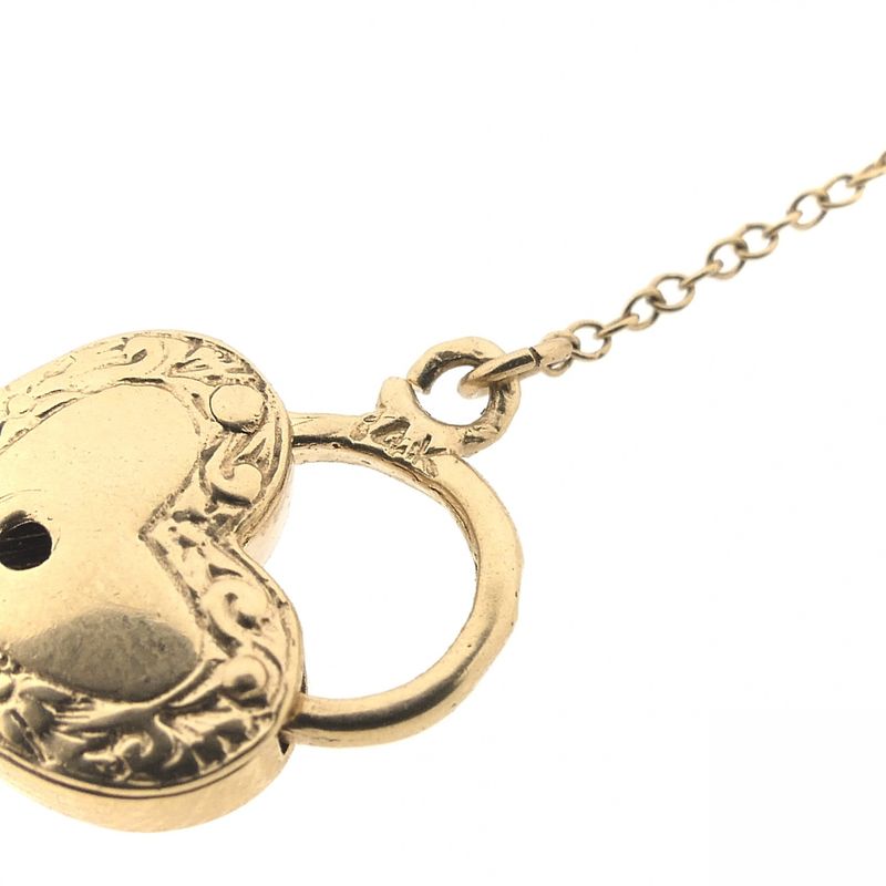 Image 10 of Gold pendant of a heart with a key