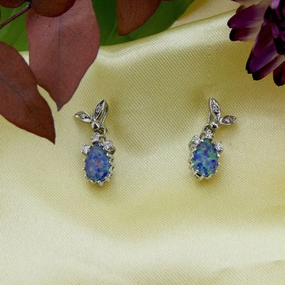 Image 2 of White gold stud earrings with diamonds and triplet opal