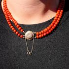Image 11 of Antique blood coral bead necklace with gold clasp.
