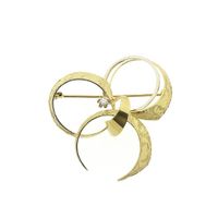 Two-tone gold brooch with diamond | 0.04 ct.