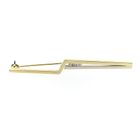 Image 1 of Two-tone gold long narrow brooch with diamonds; 0.15 ct.