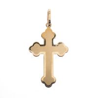 Gold pendant of a cross
