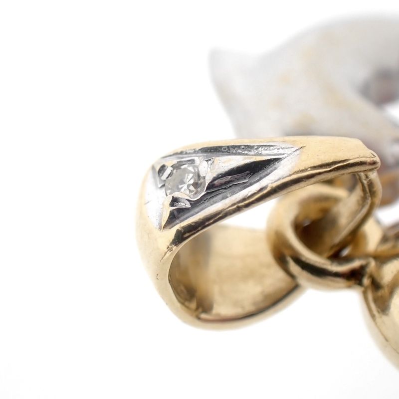 Image 5 of Two-tone gold pendant of two dolphins with diamond | 0.005 ct.