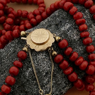 Antique blood coral bead necklace with gold clasp. Image 2 of Antique blood coral bead necklace with gold clasp.
