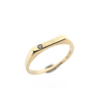 Subtle gold ring with 0.015 ct diamond.