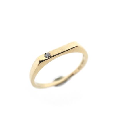 Image 1 of Subtle gold ring with 0.015 ct diamond.