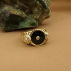 Image 2 of 18-karat gold men's signet ring with onyx and diamond | 0.025 ct.