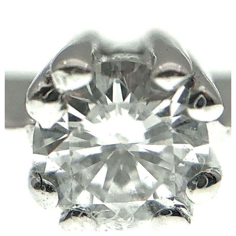 Image 2 of 18 carat white gold solitaire ring with 0.14 ct diamond.