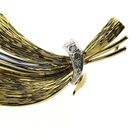 Image 3 of Two-tone gold brooch of a leaf with diamonds; 0.12 ct.