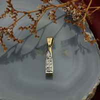 Two-tone gold pendant with zirconia; Assos