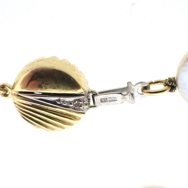 Image 13 of Pearl necklace with gold clasp.